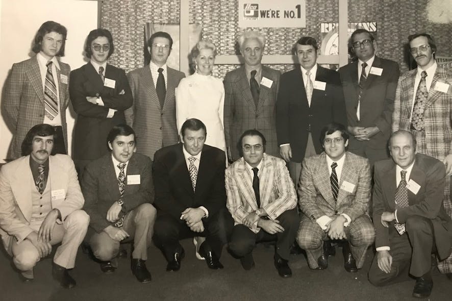 Fish (front row 4th from left) poses with his executive team at Unican in the early 1970s.