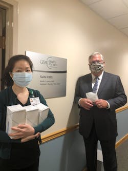 Al Saxon, SVP of Vision Technologies delivered 1000 masks to Joo Kim of GMBC's practice of Dr. Mark Lamos. Al Saxon, SVP of Vision Technologies delivered 1000 masks to Joo Kim of GMBC's practice of Dr. Mark Lamos.