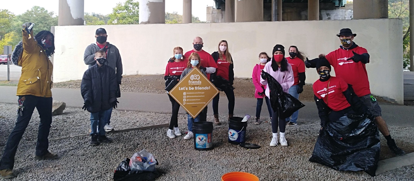 Vector Security's Pittsburgh branch employees and families joined Friends of the Riverfront to clean up the Three Rivers Heritage Trail.