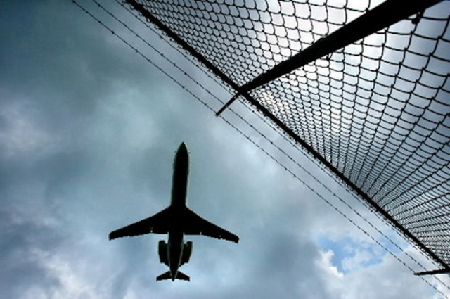 A woman was arrested last week after she crashed her vehicle through a fence and onto the airfield at Cleveland Hopkins International Airport.