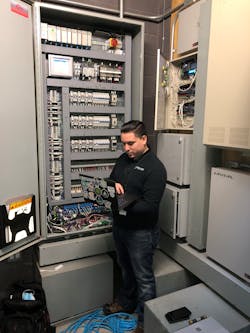 Unlimited Technology Senior Installation Technician Brayan Ramirez on site. Unlimited&apos;s team has grown 5x since the beginning of the project in 2013.