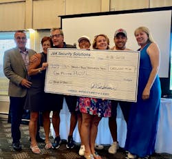 J&amp;K Security broke the $1 million mark fundraising for Domestic Abuse Intervention Services. Pictured: CEO Jeff Beckmann, President Kim Beckmann, Jim and Katie Butman of DAIS, Stephanie (Beckmann) Topel, Jeffrey Beckmann Jr., and Shannon Berry.