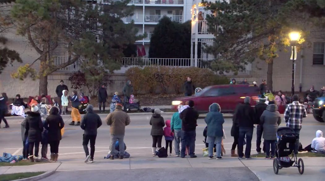 In an image captured from a video posted by the City of Waukesha on Facebook, a vehicle speeds through the Waukesha Christmas parade, on Sunday, Nov. 21, 2021, in Wisconsin. (Screenshot of City of Waukesha video/TNS)