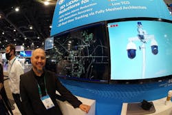 Gerald Becker, VP of Market Development and Alliances at Quanergy, stands in front of the company&apos;s CES booth.