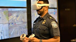 A CBP officer uses virtual reality to help design the command center at Los Angeles/Long Beach Seaport.