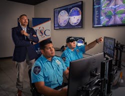 Safety and Security Executive Director Jaime Salazar of Texas Southmost College supervises staff in the command center. Safety and Security Executive Director Jaime Salazar of Texas Southmost College supervises staff in the command center.