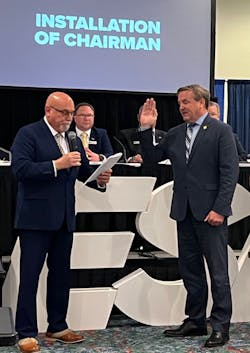 New ESA President John Loud (right) is installed as Chairman of the Association by Kirk MacDowell as outgoing ESA President Jamie Vos looks on. New ESA President John Loud (right) is installed as Chairman of the Association by Kirk MacDowell as outgoing ESA President Jamie Vos looks on.