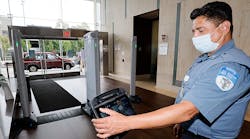 A Northwell Health security officer monitors Evolv Express at the entrance to Long Island Jewish Medical Center in New Hyde Park.