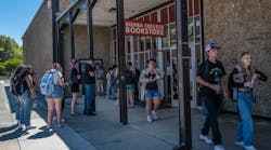 A steady stream of students line up to get their pre-ordered books on the first day of classes Monday at Sierra College book store in Rocklin. The school was hit by a cyberattack over the weekend.