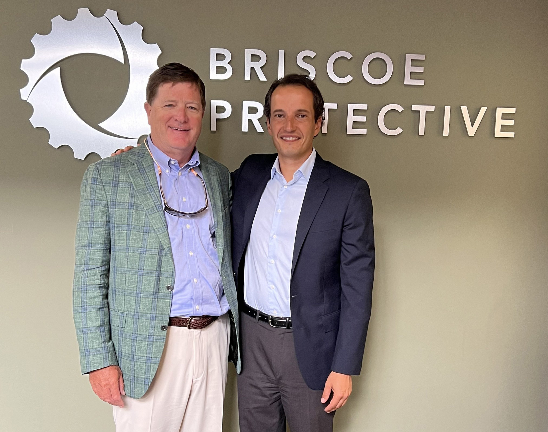 Pye-Barker CEO Bart Proctor (left, with Briscoe Protective CEO Alexander Schuil) called Briscoe Protective 'a respected name in security and fire protection for its lengthy industry experience and reputation for high-quality customer service.'