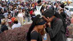 High School students were evacuated to the Schunks parking lot from the Central Visual & Performing Arts High School after a reported shooting at the school in south St. Louis on Monday, Oct. 24, 2022.