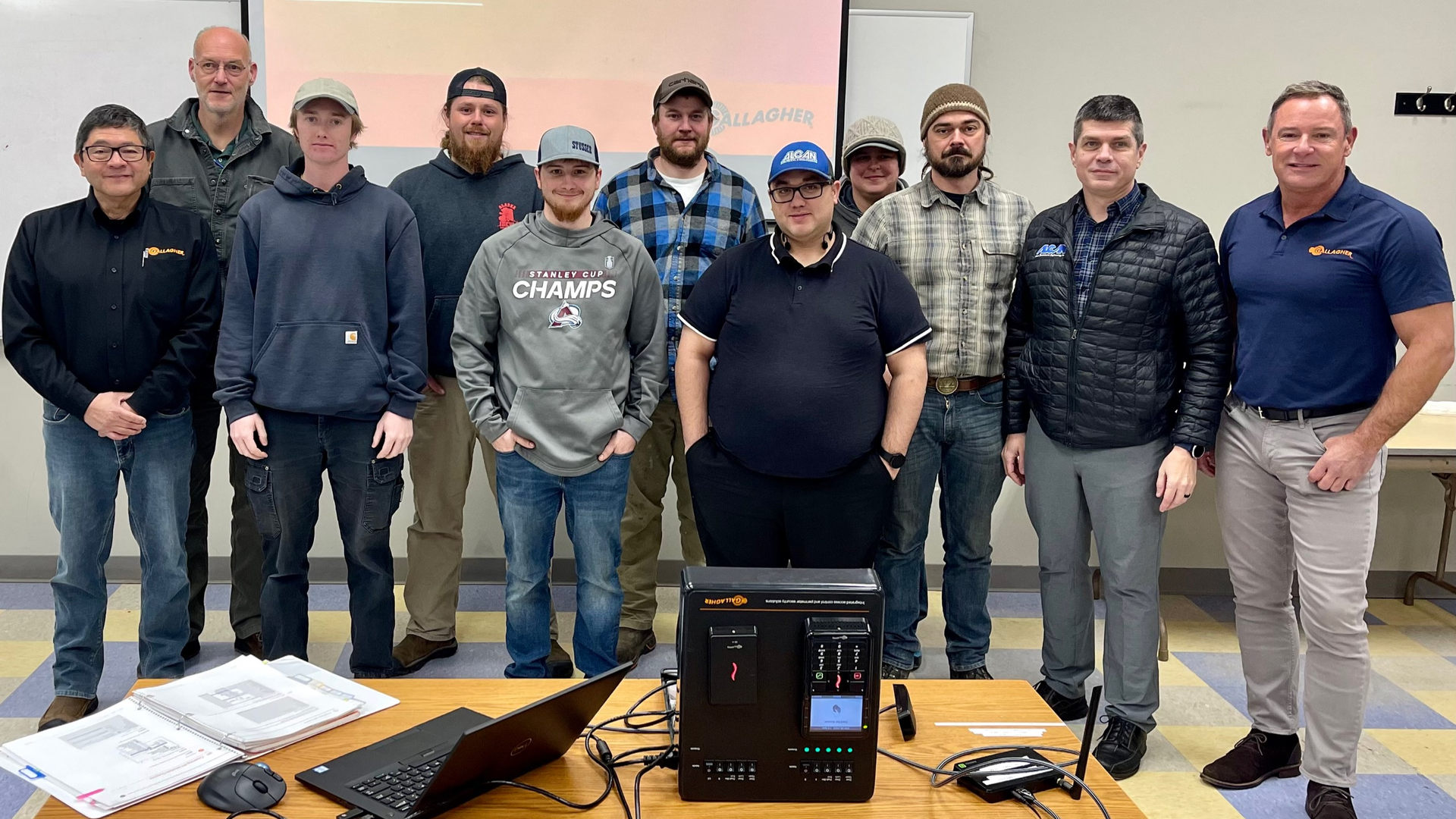 Alcan team with Warren Teafatiller, regional sales manager for Gallagher Security North America.