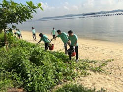 Convergint employees work to clean up a local beach as part of the annual Convergint Social Responsibility Day. Convergint employees work to clean up a local beach as part of the annual Convergint Social Responsibility Day.