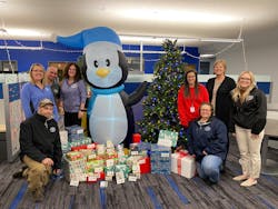 Custom Alarm collected gifts for the Adopt-a-Family program. Custom Alarm collected gifts for the Adopt-a-Family program.