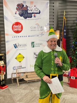 John Loud emceed a charity event as Buddy the Elf. John Loud emceed a charity event as Buddy the Elf.
