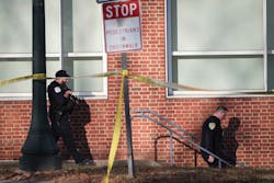 Law enforcement personnel move through the crime scene where three people were killed and two others wounded on the grounds of the University of Virginia on Nov. 14, 2022, in Charlottesville, Va. The suspect is believed to be a student. Law enforcement personnel move through the crime scene where three people were killed and two others wounded on the grounds of the University of Virginia on Nov. 14, 2022, in Charlottesville, Va. The suspect is believed to be a student.