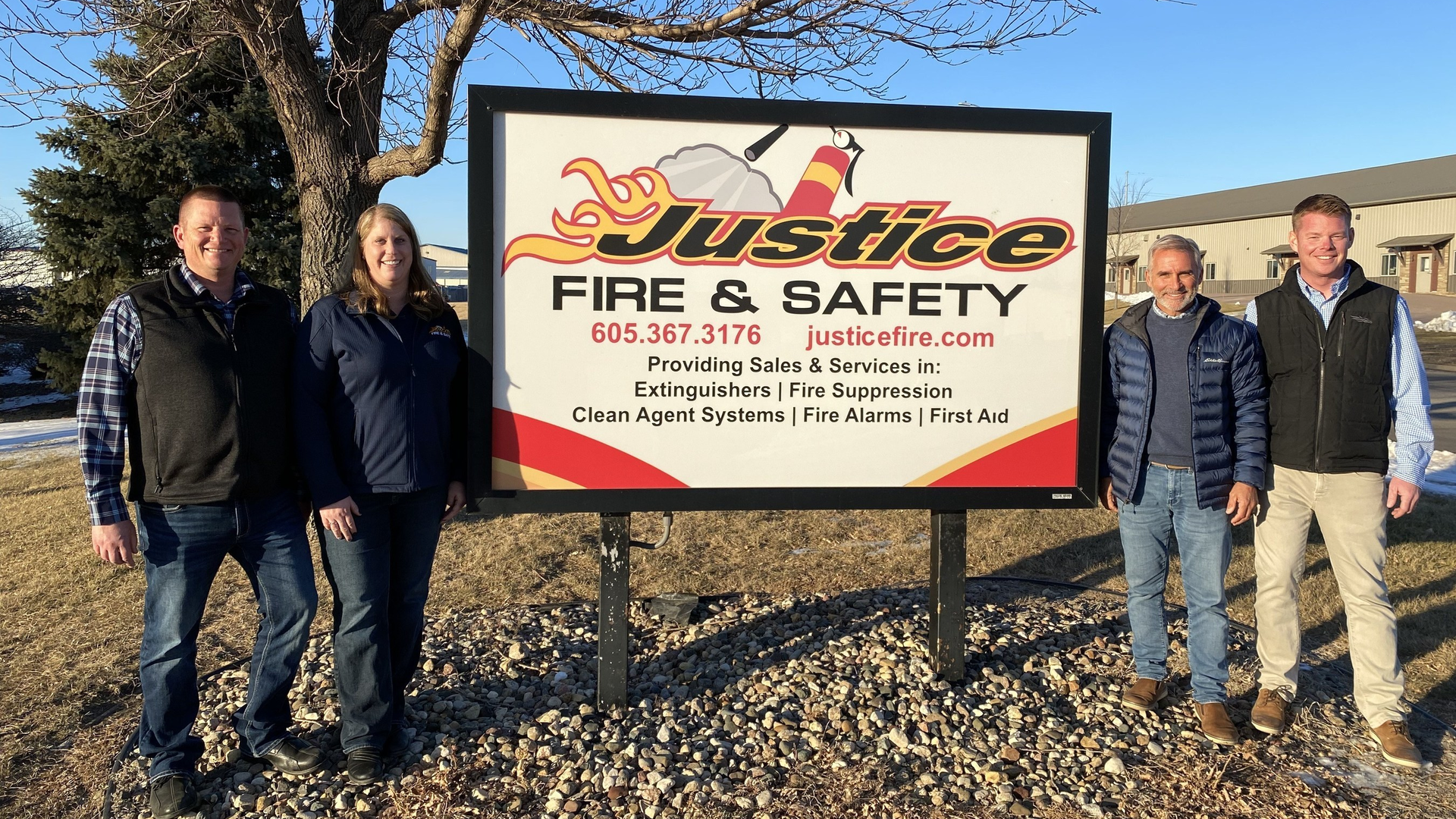 Justice Fire & Safety owners Mark and Leah Brenneman with Pye-Baker vice president of business development Chuck Reimel and regional director Chris Jensen.