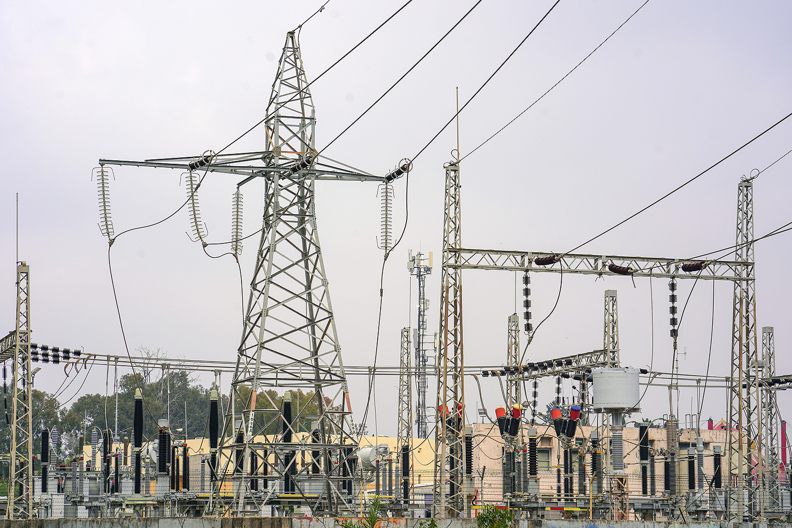 Photo of a high-voltage power transformer substation.