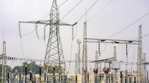 Photo of a high-voltage power transformer substation.