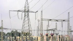 Photo of a high-voltage power transformer substation.