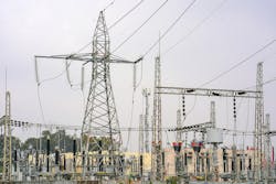 Photo of a high-voltage power transformer substation. Photo of a high-voltage power transformer substation.