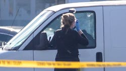 Bullet holes are visible as a coroner's official takes photos on Sunday, Jan. 22, 2023, in Torrance, California. Police say a man in a white van is connected to Saturday night's Lunar New Year mass shooting in Monterey Park. Torrance SWAT officers surrounded the van as the driver appeared slumped over the wheel. Bullet holes are visible as a coroner's official takes photos on Sunday, Jan. 22, 2023, in Torrance, California. Police say a man in a white van is connected to Saturday night's Lunar New Year mass shooting in Monterey Park. Torrance SWAT officers surrounded the van as the driver appeared slumped over the wheel.