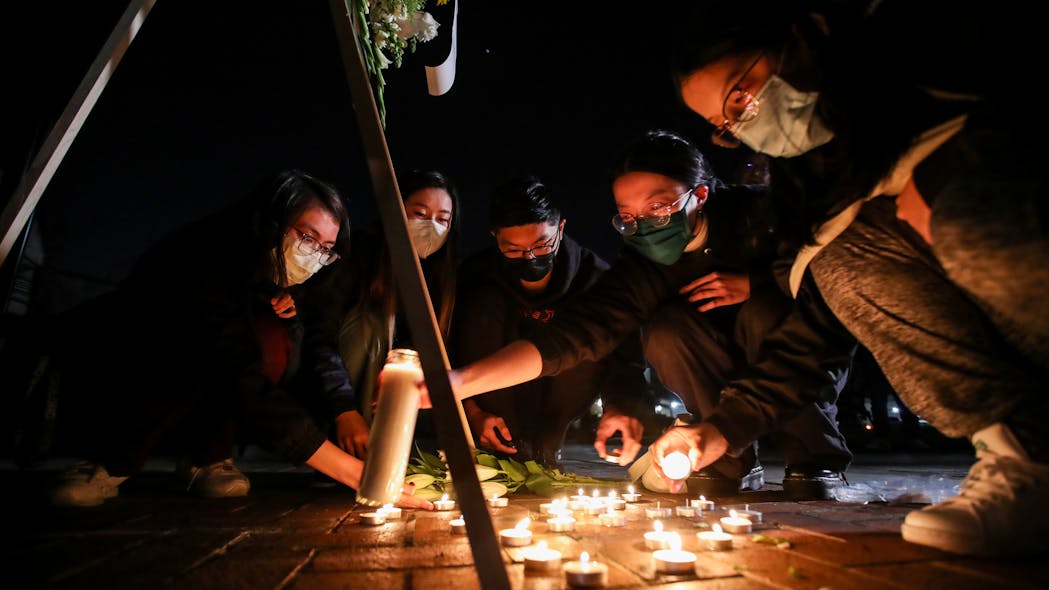 Mourners take part in a vigil for the victims of a mass shooting at the Star Dance Studio on Monday, Jan. 23, 2023, in Monterey Park, Calif.