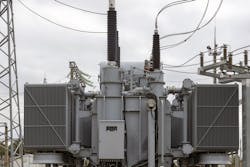Example of a modern transformer substation with many connected high-voltage wires and cables, electrical equipment maintains a stable energy voltage. Example of a modern transformer substation with many connected high-voltage wires and cables, electrical equipment maintains a stable energy voltage.