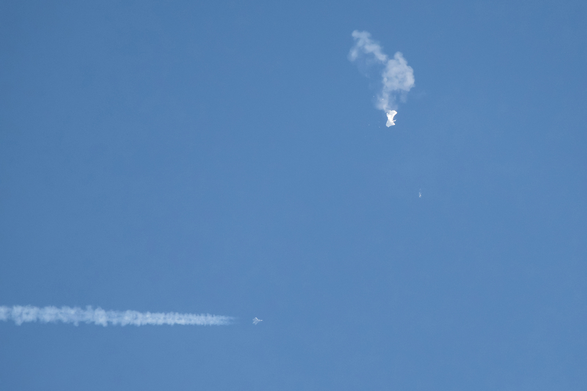 Debris falling from the sky after a Chinese spy balloon was shot down by an F22 military fighter jet over Surfside Beach, South Carolina, Saturday, Feb. 4, 2023.
