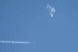 Debris falling from the sky after a Chinese spy balloon was shot down by an F22 military fighter jet over Surfside Beach, South Carolina, Saturday, Feb. 4, 2023.
