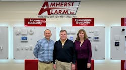 Eric Garner, President of Pye-Barker&rsquo;s Alarm Division, pictured here with Tim and Maryann Creenan of Amherst Alarm.