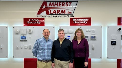 Eric Garner, President of Pye-Barker&rsquo;s Alarm Division, pictured here with Tim and Maryann Creenan of Amherst Alarm.
