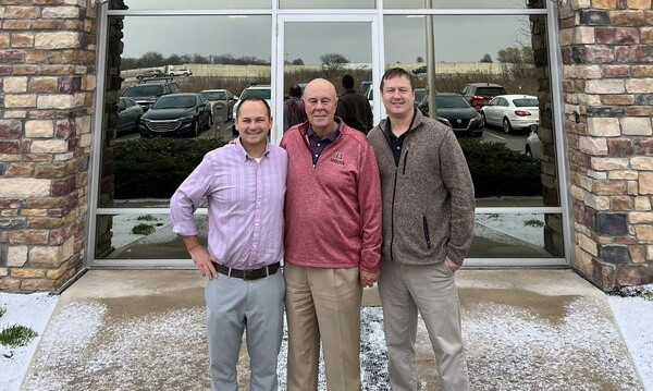 Eric Garner, President of Pye-Barker's alarm division, meets with Chip Shiver and Wayne Lisle of newly acquired Shiver Security Systems.