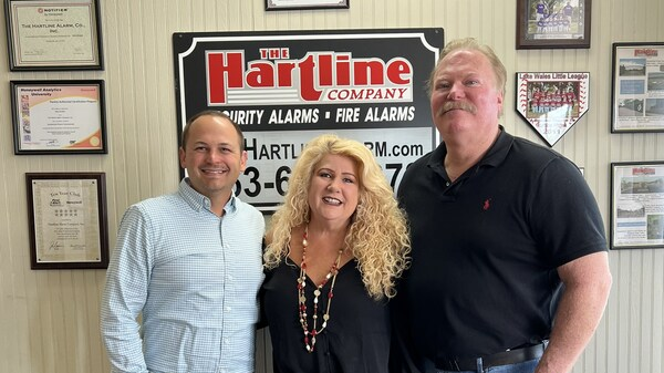 Eric Garner, President of Pye-Barker's Alarm Division, meets with Alan and Candi Hartline of The Hartline Company.