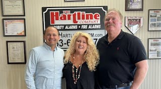 Eric Garner, President of Pye-Barker&apos;s Alarm Division, meets with Alan and Candi Hartline of The Hartline Company.