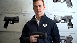 Kai Kloepfer, the founder and CEO of &apos;smart gun&apos; manufacturer Biofire Technologies, stands for a portrait in the model room against product drawings at the company&apos;s corporate headquarters in Broomfield on Friday, April 14, 2023.