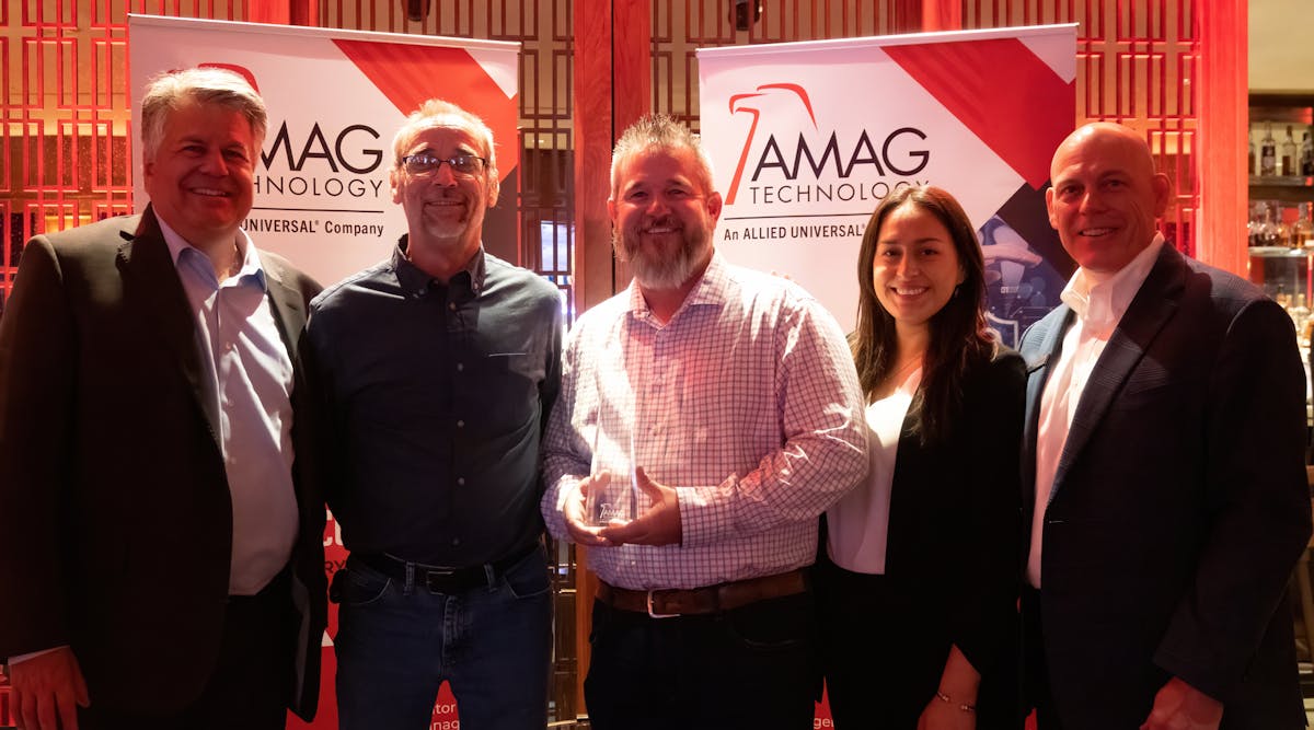 AMAG Technology President, David Sullivan, (left) presents an Eagle Award to Automation Integrated for Top Reseller in the Central South. Next to Sullivan in order are Automation Integrated Director of Engineering, Ron Free and Regional Account Executive, Travis Baird, AMAG Technology Regional Sales Manager, Jessika Westerman and Director of Sales, Fred Nelson.