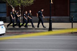 Law enforcement officers respond to an active shooter near the Old National Bank building on April 10, 2023, in Louisville, Ky. Five people are dead and at least six more have been hospitalized. Law enforcement officers respond to an active shooter near the Old National Bank building on April 10, 2023, in Louisville, Ky. Five people are dead and at least six more have been hospitalized.