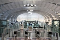 Security control machines and departures area at Bangkok Suvarnabhumi International Airport. Security control machines and departures area at Bangkok Suvarnabhumi International Airport.