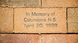 A brick in a sidewalk in Denver in memory of the Columbine High School shooting in April 1999.