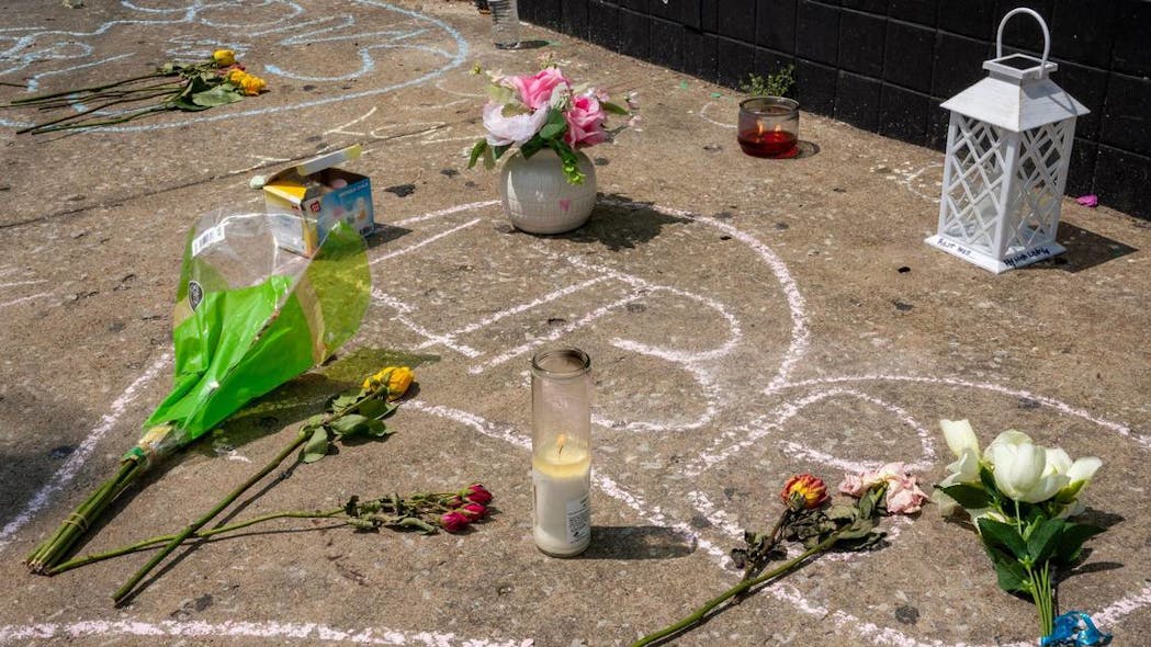 Messages written in chalk are seen on the sidewalk outside Klymax Lounge on Monday, May 22, 2023, in Kansas City. Three people were killed and two were injured in a shooting Sunday at the nightclub.