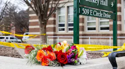 Flowers outside Berkey Hall following a mass shooting the evening before on the campus of Michigan State University in East Lansing, Michigan on Tuesday, Feb. 14, 2023.