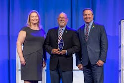 Kirk MacDowell (center) was honored with ESA&apos;s Sara Jackson Award at ESX.