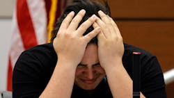 Former Marjory Stoneman Douglas High School student Kyle Laman, who was injured in the 2018 shootings, reacts as surveillance video of the massacre is played in court on the second day of testimony in the case of former MSD High School School Resource Officer Scot Peterson at the Broward County Courthouse in Fort Lauderdale, Fla. on Thursday, June 8, 2023. Former Marjory Stoneman Douglas High School student Kyle Laman, who was injured in the 2018 shootings, reacts as surveillance video of the massacre is played in court on the second day of testimony in the case of former MSD High School School Resource Officer Scot Peterson at the Broward County Courthouse in Fort Lauderdale, Fla. on Thursday, June 8, 2023.