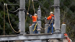 A crew works at an electrical substation in Washington state that was damaged by vandals early on Christmas morning, Dec. 25, 2022. A crew works at an electrical substation in Washington state that was damaged by vandals early on Christmas morning, Dec. 25, 2022.