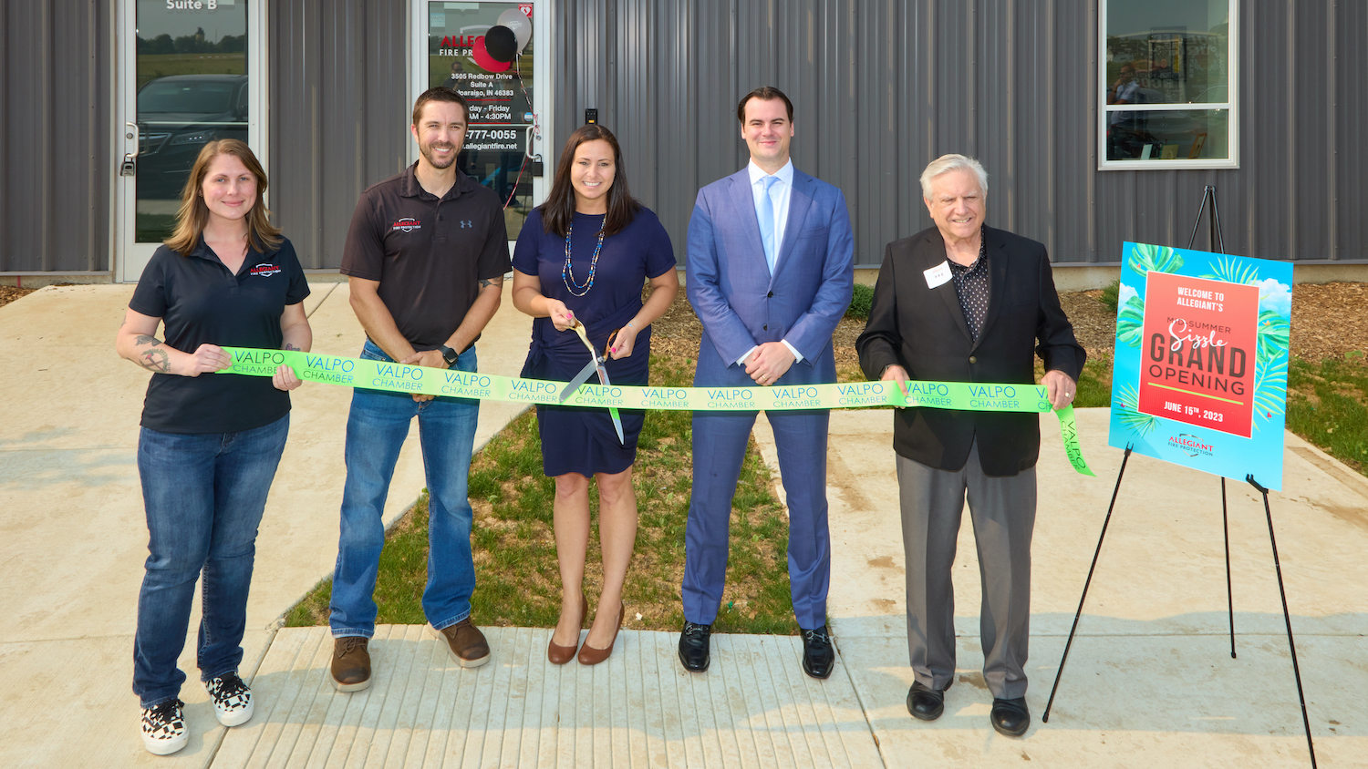 From left, Allegiant Office Manager Jessica Thibodeau, Allegiant President Mike Carli, Allegiant Vice President Jill Nottke, Endeavor Fire Protection CEO Robert Lane, and Valparaiso Chamber President Rex G. Richards attend a ribbon-cutting ceremony that welcomes Allegiant Fire Protection to the Valparaiso business community.