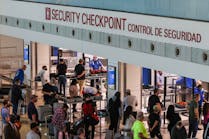 Travelers go through security checkpoint at the Dallas Love Field airport in Dallas. Biometric technology, such as facial recognition, is increasingly being used in TSA s identity verification process.