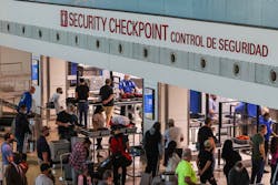 Travelers go through security checkpoint at the Dallas Love Field airport in Dallas. Biometric technology, such as facial recognition, is increasingly being used in TSA s identity verification process. Travelers go through security checkpoint at the Dallas Love Field airport in Dallas. Biometric technology, such as facial recognition, is increasingly being used in TSA s identity verification process.