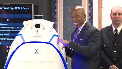 New York City Mayor Eric Adams poses with NYPD&apos;s newest crime fighter - the Knightscope K5.