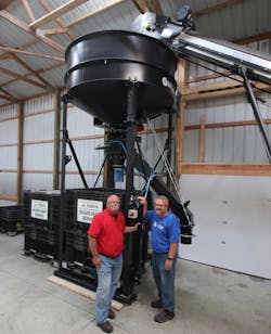 Upon discussing a rise in theft and potential risks to his opperation, Tech Zone owner Robert Smith (left) helped Paul Olson deploy a cloud based video surveillance system for Olson Seed Service.